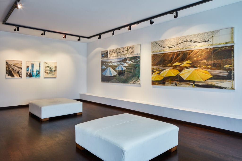 Collages by Christo & Jeanne-Claude on display in the East Hall at The Gallery at Windsor